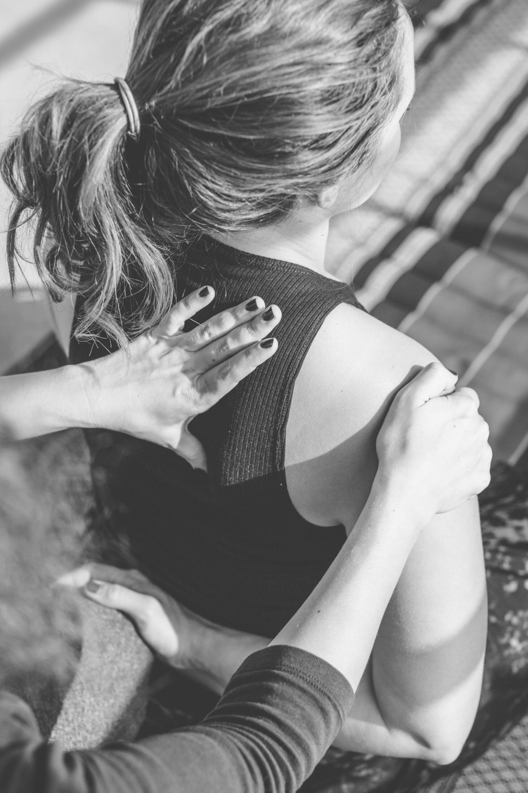 Thai massage shoulder stretch at Venet Massage and Wellness, Seattle Therapist guides a client’s shoulder stretch during Thai massage at Venet Massage & Wellness in Phinney Ridge, Seattle.